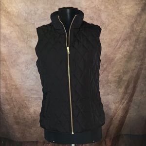 Black puffy vest